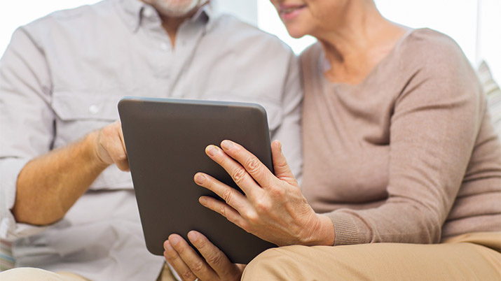 Picture of people looking at patient portal