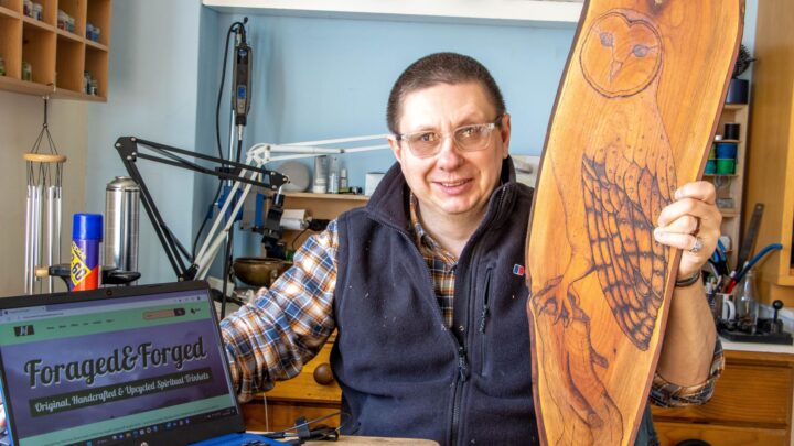 Simon Hobbs from Swanage with the laptop that was gifted to him by the Digital Doorway scheme and one of the crafts he has made.