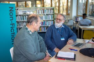 Volunteer digital champion with Patrick, one of his regular visitors