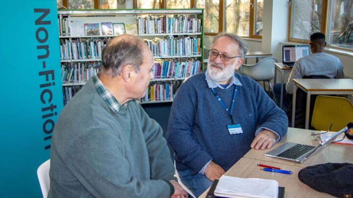 Volunteer digital champion with Patrick, one of his regular visitors