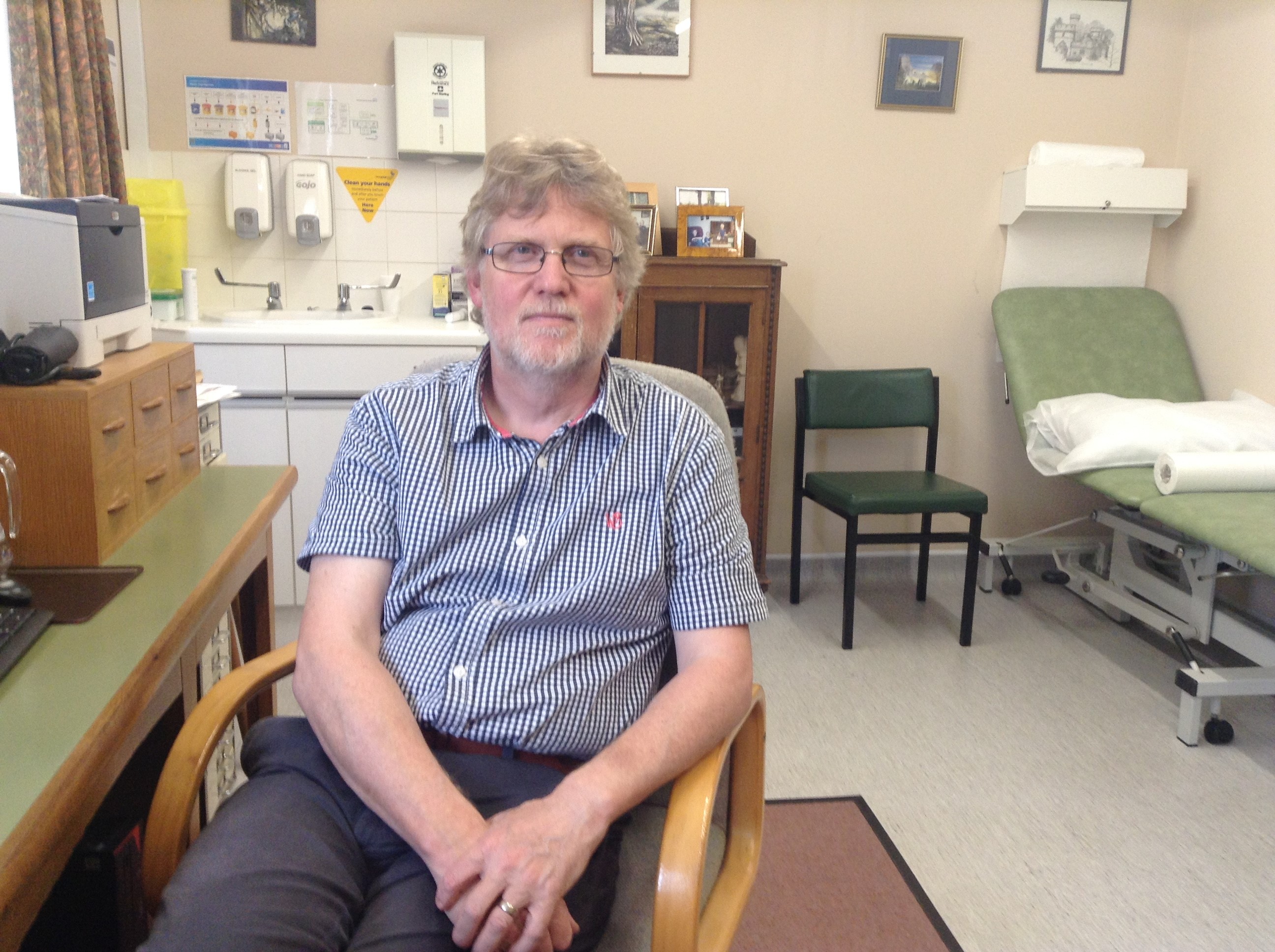 Dr Craig Wakeham in his consultation room