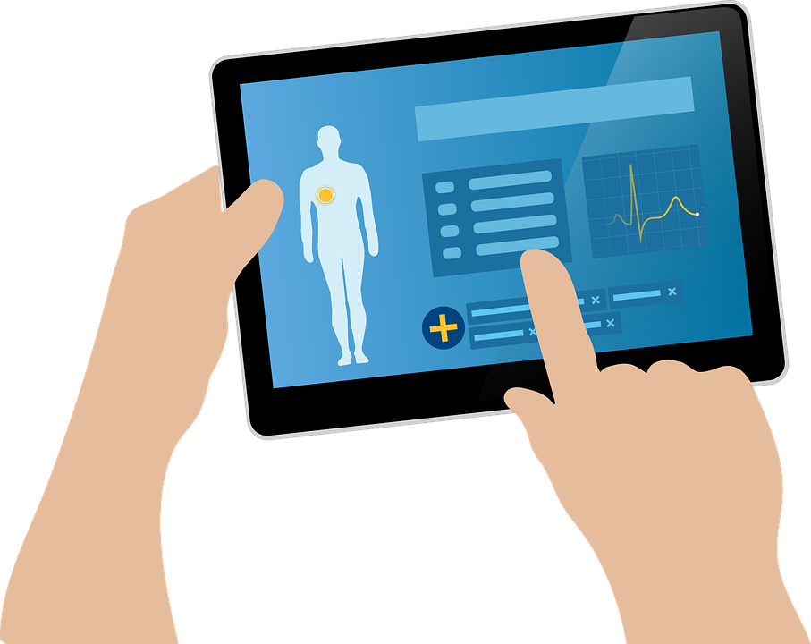 A person with an electronic tablet