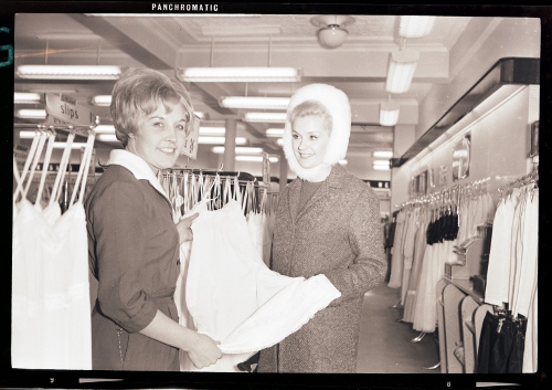 A store assistant helps Lesley around the M&S lingerie aisle