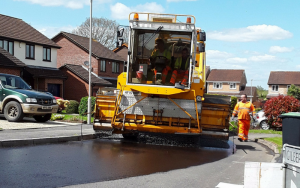 surface dressing vehicle in action on Dorset road