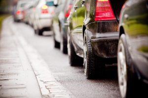 Queuing cars on a road
