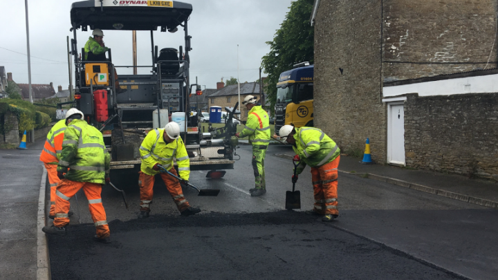 Surfacing paver machine in action