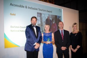 Durlston accepting their Gold award for Accessible and Inclusive Tourism