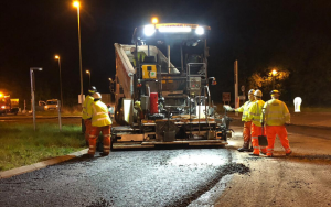 paver machine operating at night
