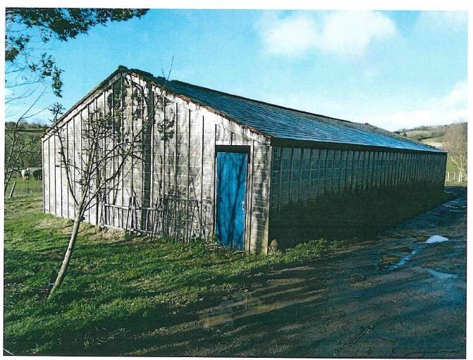 To show the unauthorised barn at Unauthorised barn at Willow Farm, Longbarrow Lane, Stoke Abbott, Beaminster