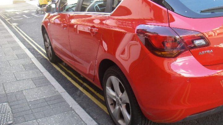 Car on double yellows