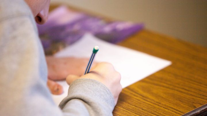 Young person sitting an exam