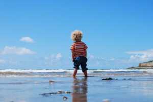 Toddler by the sea