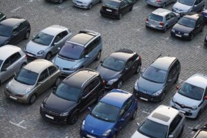 Aerial view of cars parked in car park