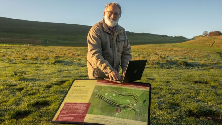 Wherever you are in Dorset a Digital Champion is waiting to help you on the other end of the Dorset Digital Hotline. Pictured: Digital Champion Mike Watson at Maiden Castle.