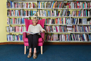 Woman sat in library