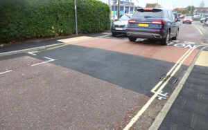New road hump in station road with imprinted surface and red colour coating