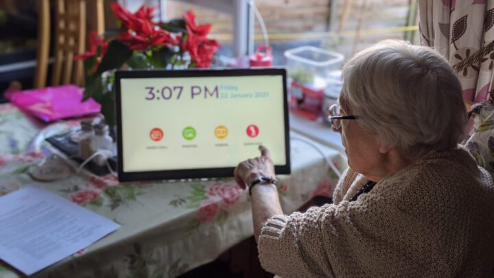 Joan, 87 and from north Dorset, with her new Ethel device, which connects her to loved ones, carers and her friends from the day centre.