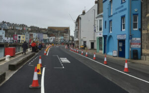Looking along Custom House Quay in Weymouth with temporary road markings in place