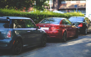 cars parked alongside road