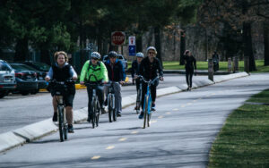 group of adults cycling on shared use path