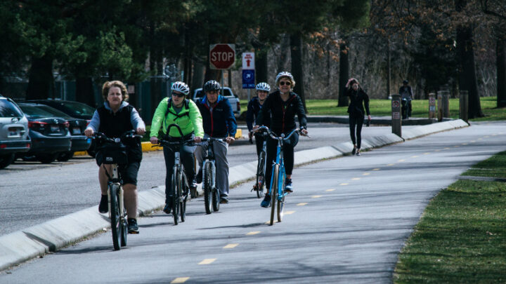 group of adults cycling on shared use path