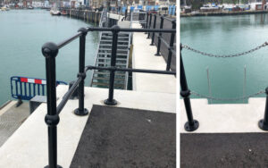 Key clamp railings and chain link railings in place elsewhere on Weymouth harbour