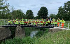 schoolchildren on the new footbridge