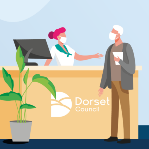 man and lady at reception desk