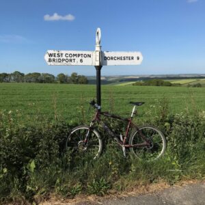 signpost and bicycle