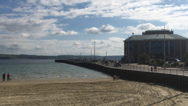 A view of Weymouth pavilion and the car park from the beach