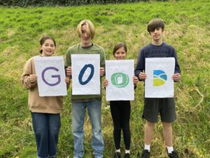 Ofsted children holding GOOD sign