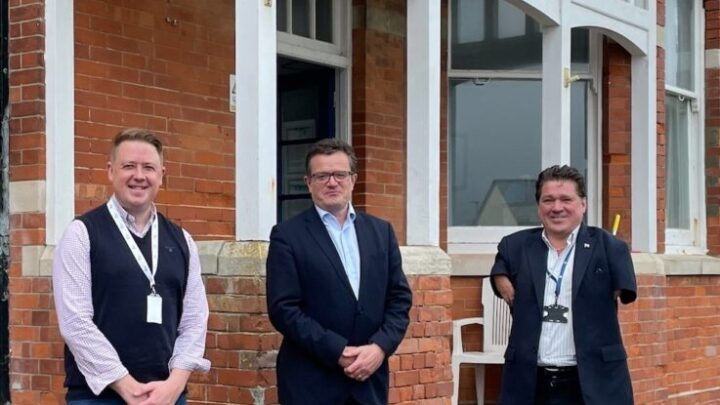 (l-r) Mike Graham, CEO at Lantern Trust, Andrew Billany, Director for Housing at Dorset Council and Cllr Graham Carr-Jones, Portfolio holder for housing stood together for a picture