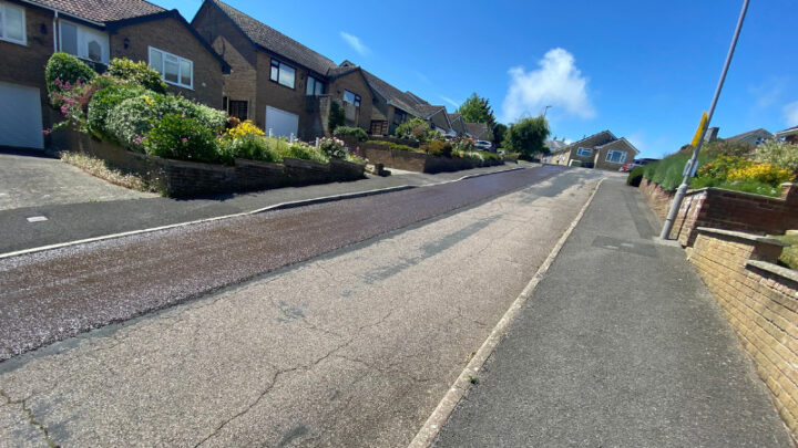 a Dorset road half surfaced and half not surfaced
