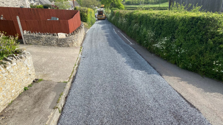 country lane being surface dressed