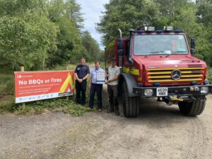A sign explaining that fires are banned from the area