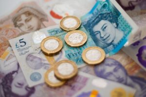Picture of £20, £10 and £5 notes and a few pound coins