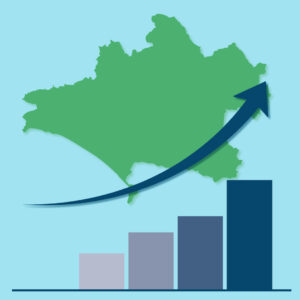 Picture of Dorset with a Blue arrow pointing up and a bar graph