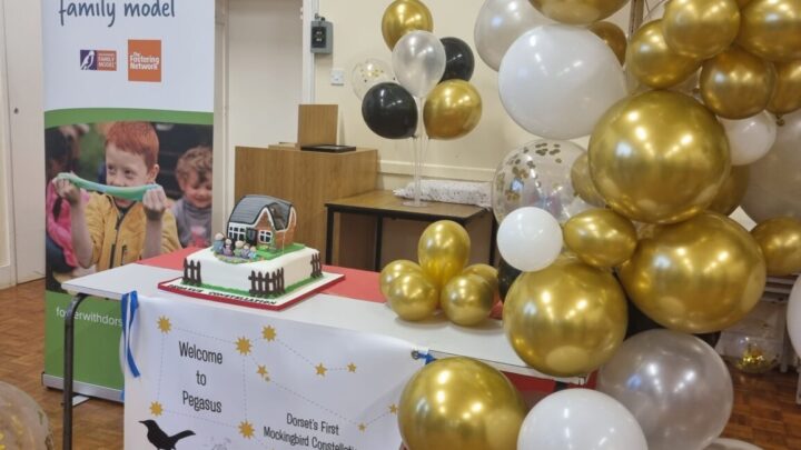 balloons banner and celebration cake