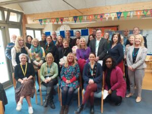 The image shows a group of people who attended the Swange stakeholder event in February