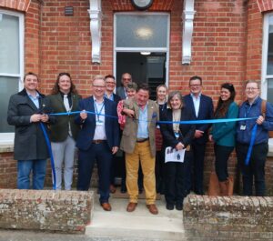 members of the team outside the newly renovated building 