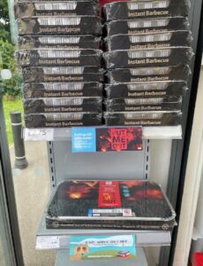 A display of disposable barbecues for sale