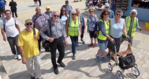Weymouth and Portland health walk participants walking along street