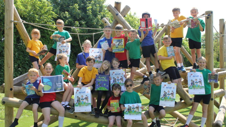 Group of schoolchildren on playground equipment