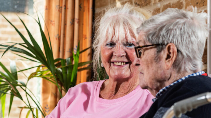 Two people looking at each other