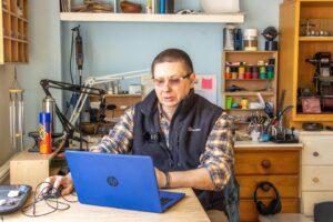 A man using his laptop