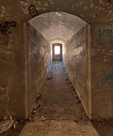 image showing long tunnel with light at end