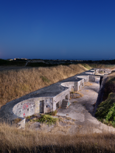 photograph of historic high angle battery site with night sky in background