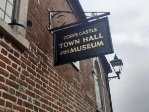 Building sign for Corfe Castle Town Hall and Museum