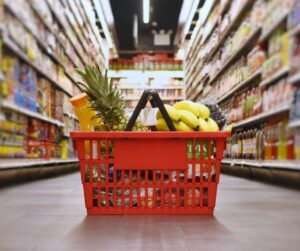 Basket full of food in a supermarket