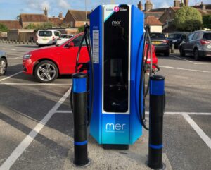 blue and black electric vehicle chargepoint in car park